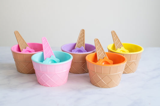 Colourful ice cream cone bowls with matching cone-shaped spoons for slime play
