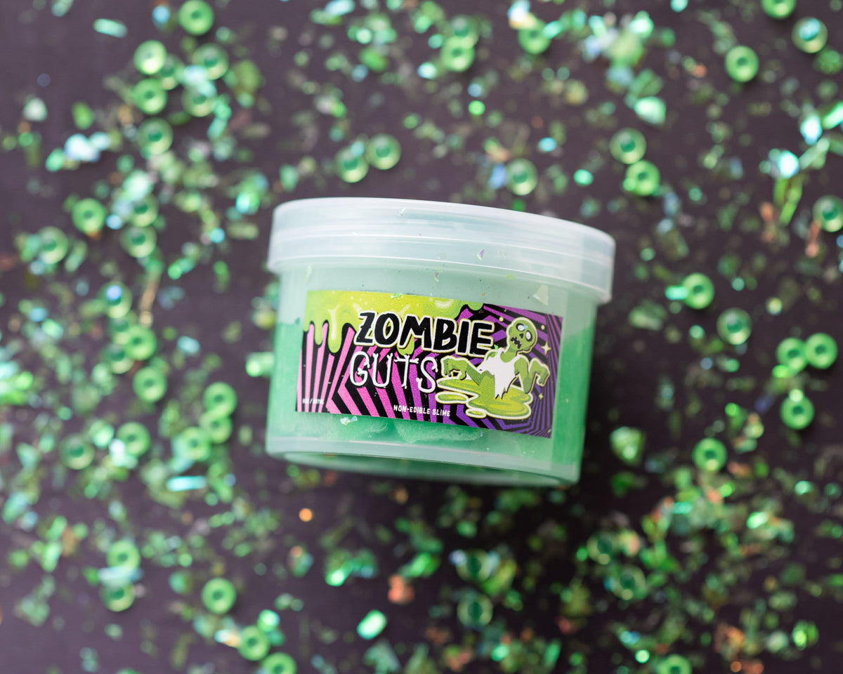 Zombie Guts green Halloween fishbowl slime jar on green glitter — Lil' Slimetastic